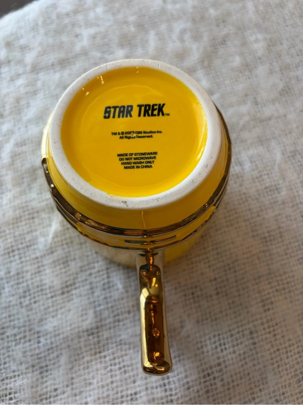 Star Trek star fleet stoneware yellow coffee mug.  22oz.